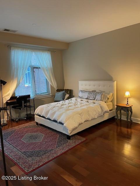324 E Main St Unit 405, Louisville, KY 40202 - bedroom with hardwood / wood-style floors