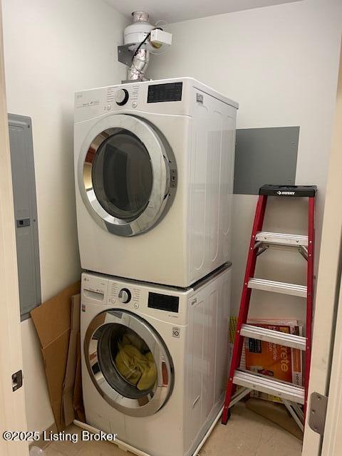 324 E Main St Unit 405, Louisville, KY 40202 - clothes washing area with electric panel, tile patterned flooring, and stacked washer / drying machine