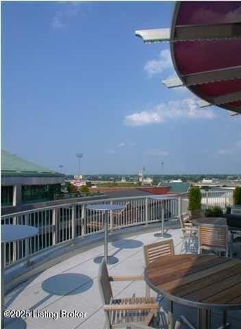 324 E Main St Unit 405, Louisville, KY 40202 - wooden terrace with a patio area