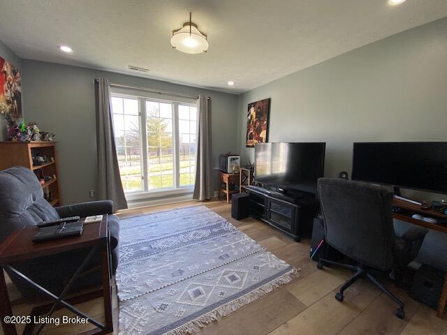 office space featuring light hardwood / wood-style floors