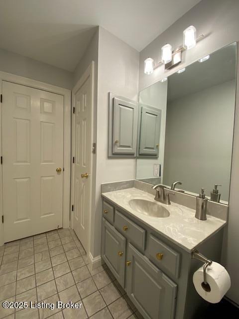 bathroom with vanity and tile patterned floors