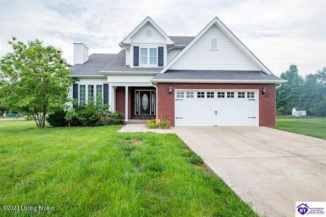 110 E Mandarin Ct, Elizabethtown, KY 42701 - view of front of house with a garage and a front lawn