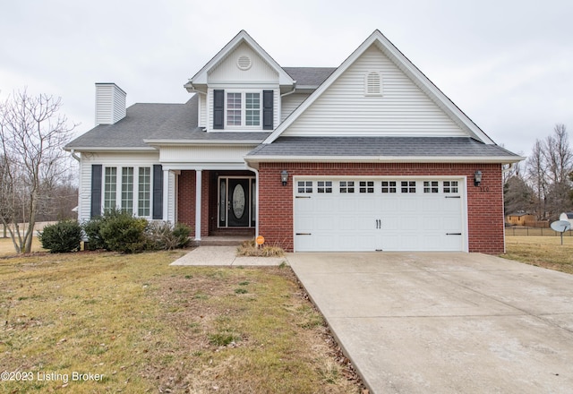 110 E Mandarin Ct, Elizabethtown, KY 42701 - view of front of house with a garage and a front lawn