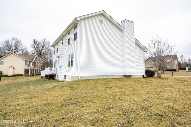110 E Mandarin Ct, Elizabethtown, KY 42701 - view of side of property with a lawn and a deck