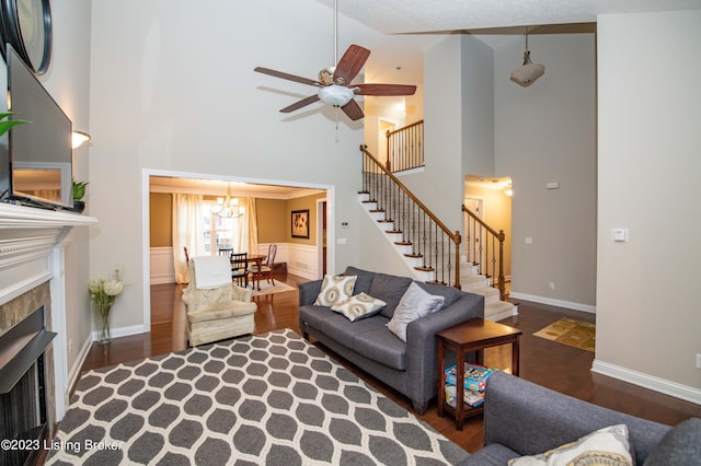 110 E Mandarin Ct, Elizabethtown, KY 42701 - living room with a high ceiling, dark wood-type flooring, a chandelier, and a fireplace