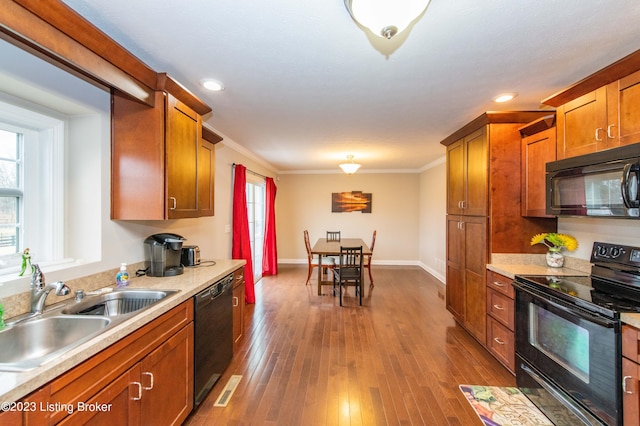 110 E Mandarin Ct, Elizabethtown, KY 42701 - kitchen featuring sink, ornamental molding, black appliances, and dark hardwood / wood-style floors