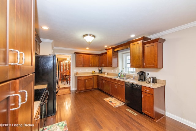 110 E Mandarin Ct, Elizabethtown, KY 42701 - kitchen featuring sink, crown molding, dark wood-type flooring, and black appliances
