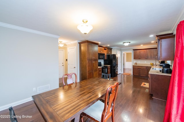 110 E Mandarin Ct, Elizabethtown, KY 42701 - dining room with ornamental molding and dark hardwood / wood-style flooring