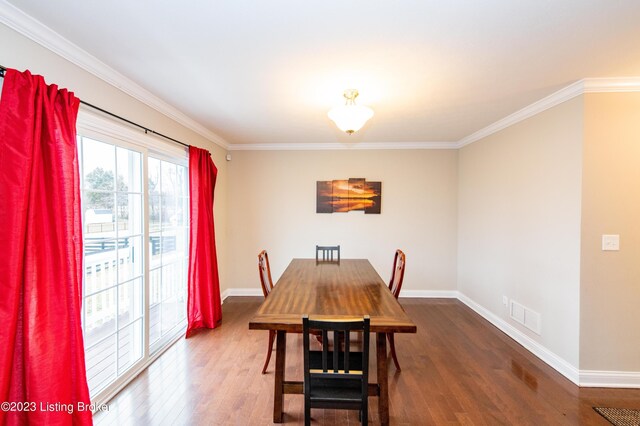 110 E Mandarin Ct, Elizabethtown, KY 42701 - dining area with ornamental molding and dark hardwood / wood-style flooring