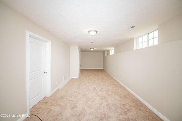 110 E Mandarin Ct, Elizabethtown, KY 42701 - basement with light colored carpet and a textured ceiling
