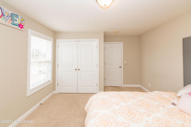 110 E Mandarin Ct, Elizabethtown, KY 42701 - carpeted bedroom featuring a closet and multiple windows