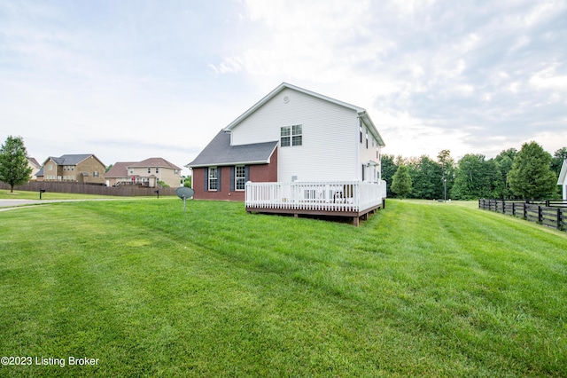110 E Mandarin Ct, Elizabethtown, KY 42701 - back of house featuring a deck and a lawn