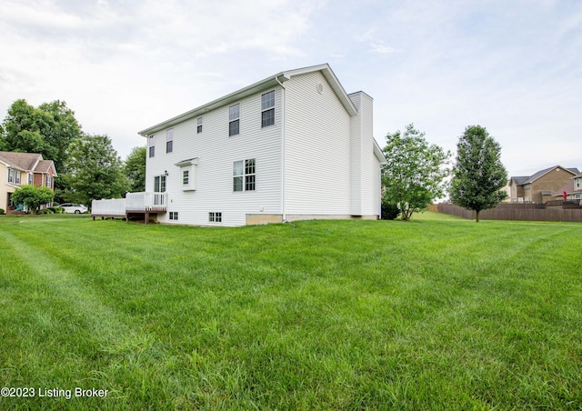 110 E Mandarin Ct, Elizabethtown, KY 42701 - rear view of property featuring a wooden deck and a lawn