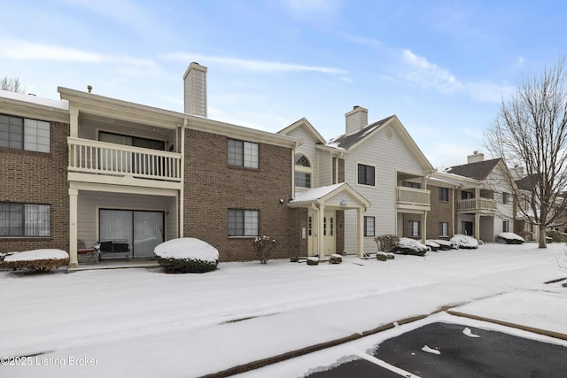 view of snow covered property