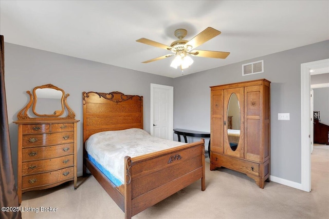 bedroom with light colored carpet and ceiling fan