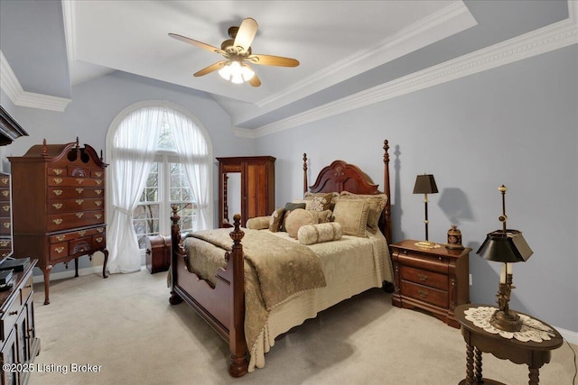 bedroom with ornamental molding, vaulted ceiling, light colored carpet, and ceiling fan