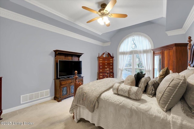 carpeted bedroom featuring ornamental molding and ceiling fan