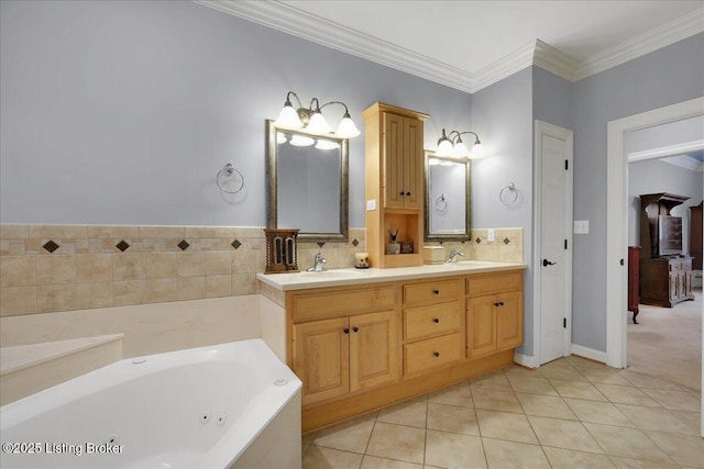 bathroom with crown molding, vanity, tile patterned flooring, and a tub