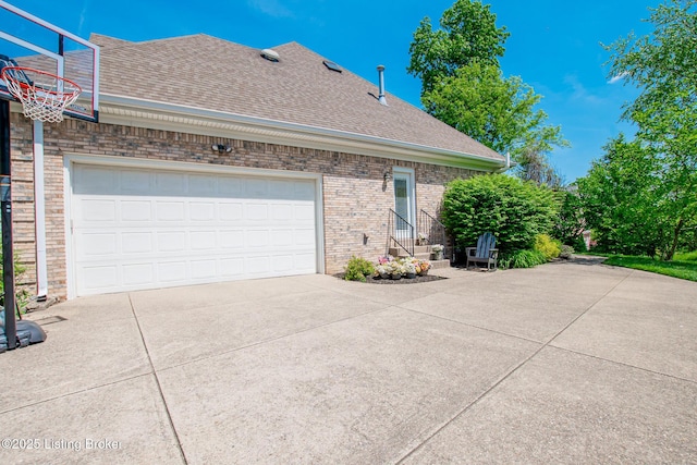 view of side of property featuring a garage