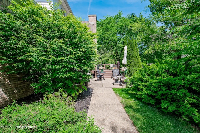 view of home's community with a wooden deck