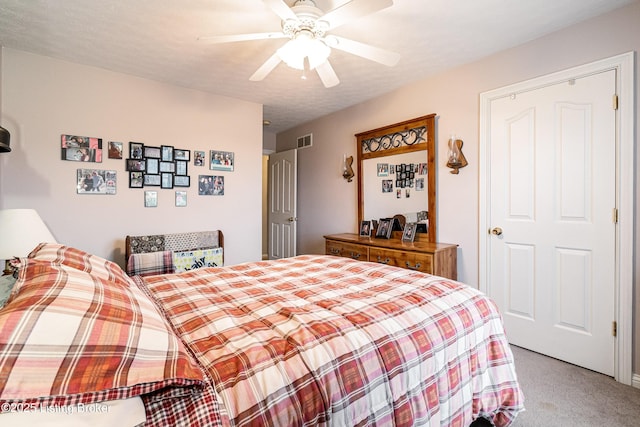 carpeted bedroom featuring ceiling fan