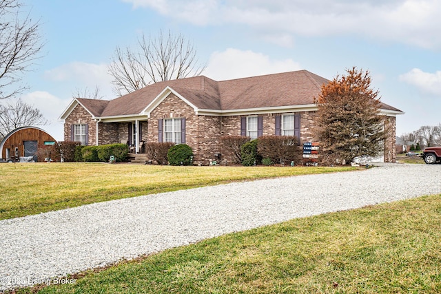 ranch-style house with a front yard