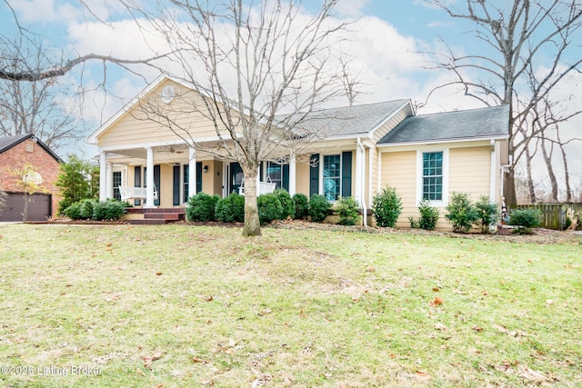 view of front of home with a front lawn and covered porch