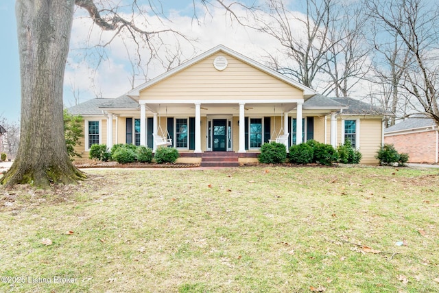 view of front of home with a front lawn and a porch