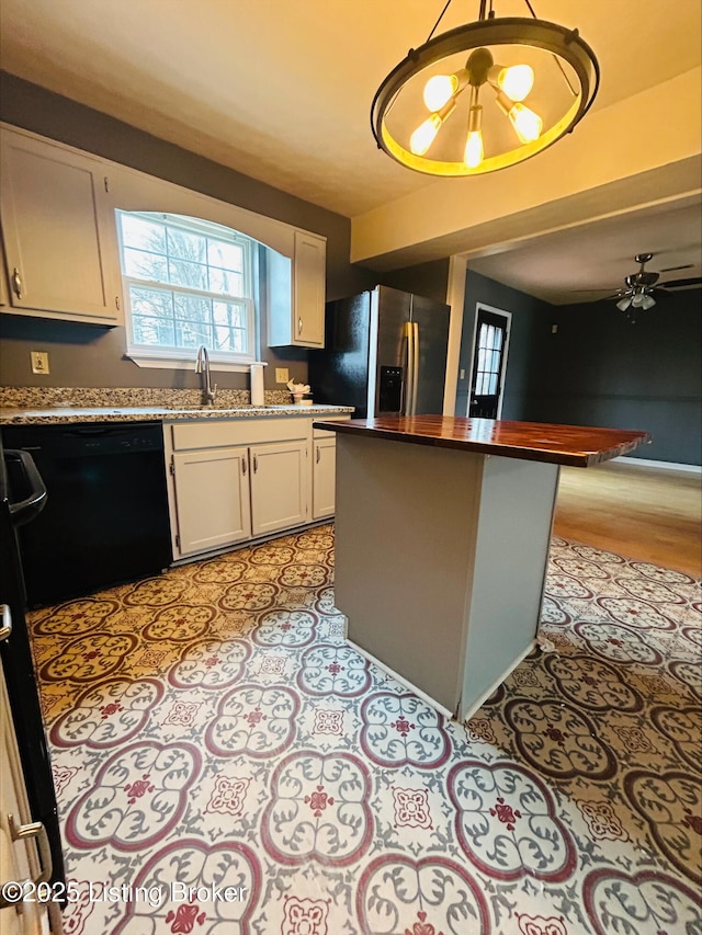 223 Lea Ct, Rineyville, KY 40162 - kitchen featuring wooden counters, black dishwasher, refrigerator with ice dispenser, white cabinetry, and a sink