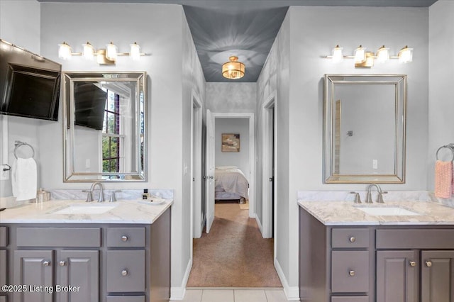 bathroom featuring vanity and tile patterned flooring