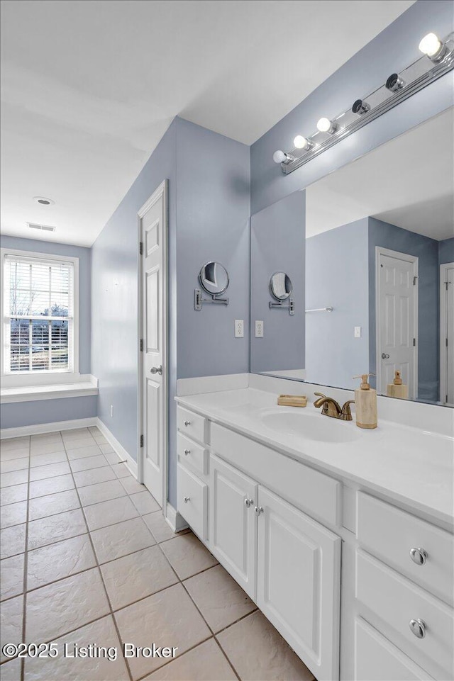 bathroom featuring vanity and tile patterned floors