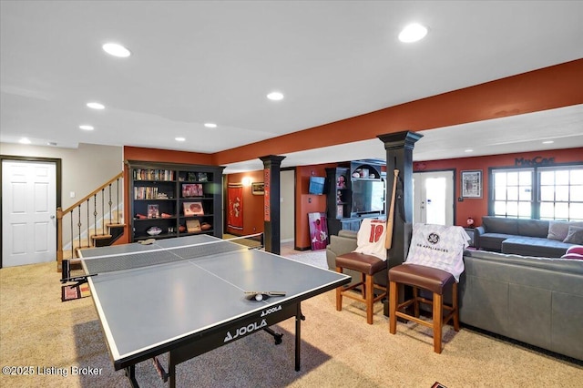 playroom with light carpet and decorative columns