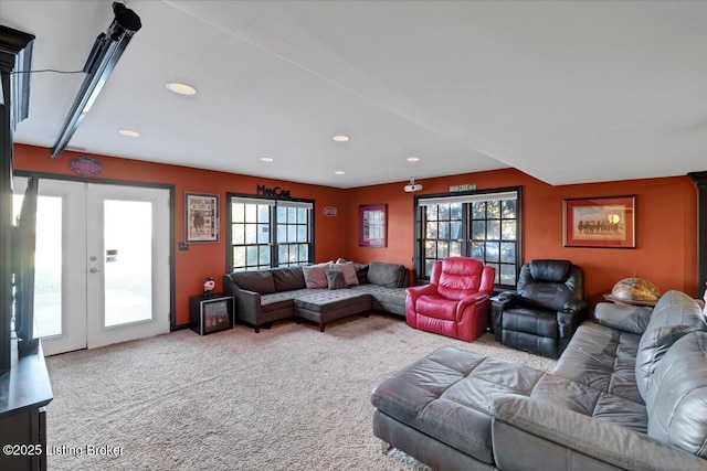 living room with carpet flooring and french doors