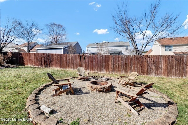 view of yard with an outdoor fire pit