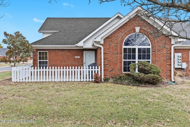 view of front of home with a front yard