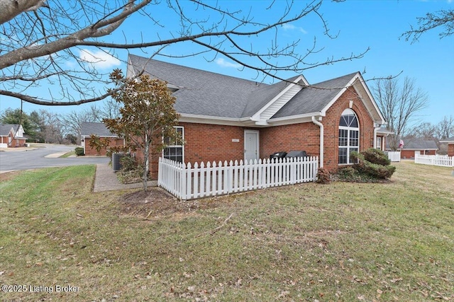 view of home's exterior featuring a lawn