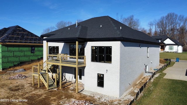 rear view of house with a deck