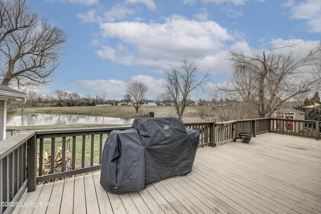 deck featuring a water view