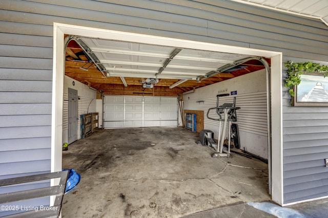 garage featuring a garage door opener