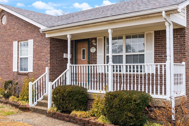 property entrance featuring covered porch