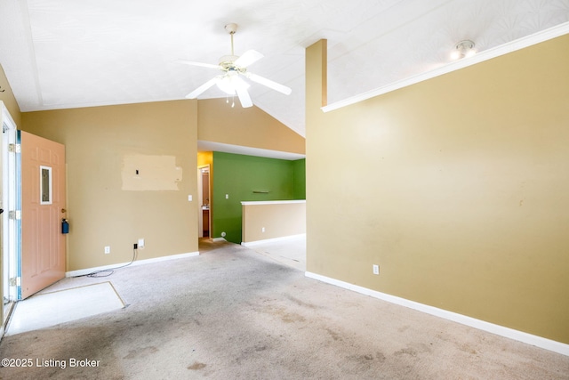 unfurnished living room with high vaulted ceiling, light carpet, and ceiling fan