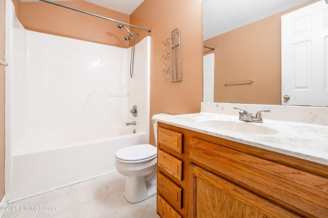 full bathroom with vanity, tub / shower combination, and toilet