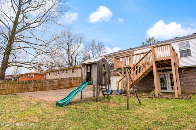 view of play area featuring a lawn