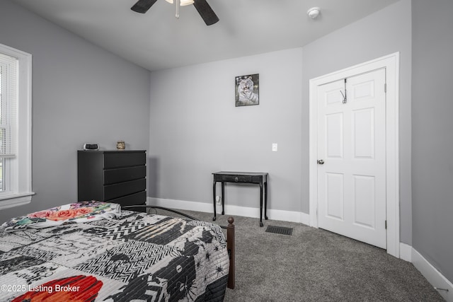 carpeted bedroom featuring ceiling fan