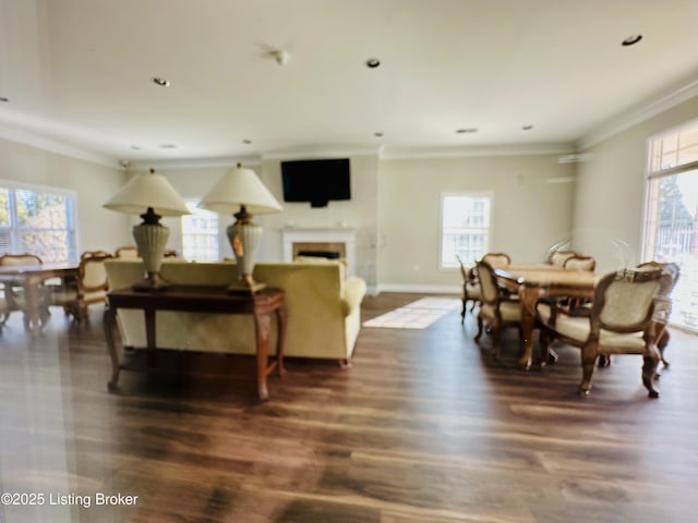 dining room with dark wood-type flooring and ornamental molding