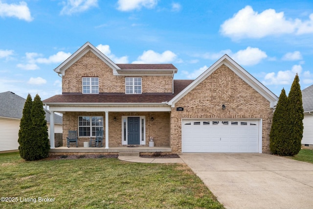 front facade featuring a front lawn, a porch, and a garage