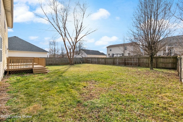 view of yard featuring a deck