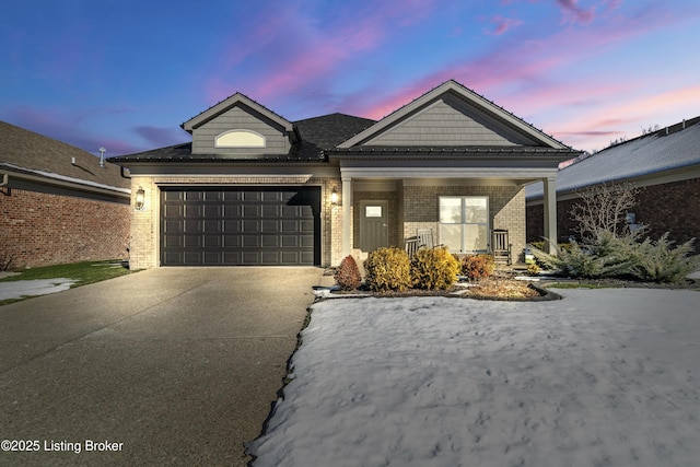 view of front of property featuring a garage