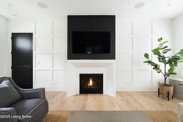 living room with light hardwood / wood-style floors