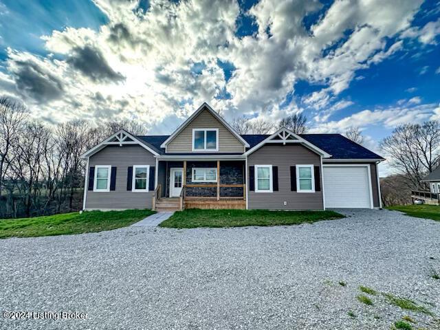 view of front of property with driveway and an attached garage